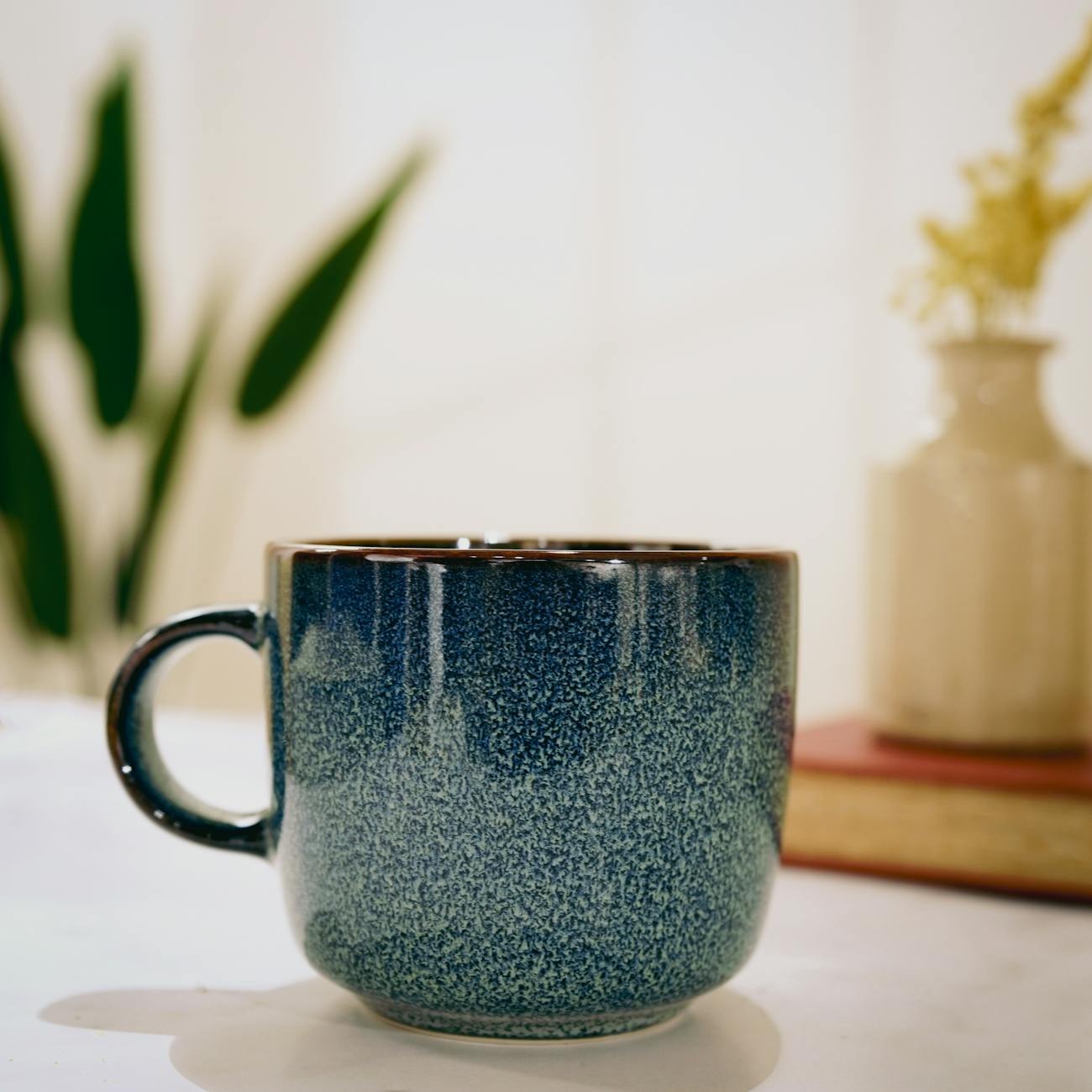 Emerging ceramic artist at work in studio